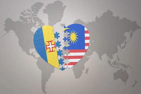 在世界地图的背景上 与马来西亚和马德拉国旗拼凑在一起 3D插图 — 图库照片