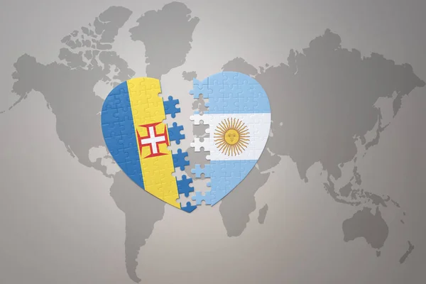 Puzzle Srdce Národní Vlajkou Argentiny Madeiry Pozadí Mapy Světa Koncept — Stock fotografie