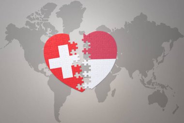 Endonezya 'nın ulusal bayrağını taşıyan bir bulmaca kalbi ve bir dünya haritası üzerinde geçiş. 3B illüstrasyon