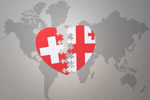 Головоломка Сердце Национальным Флагом Грузии Швейцарии Фоне Карты Мира Концепт — стоковое фото