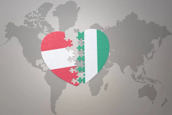 Puzzleherz Mit Der Nationalflagge Nigerias Und Österreichs Auf Einer Weltkarte — Stockfoto