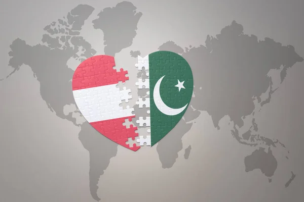 Сердце Головоломки Национальным Прапором Пакистану Аустрии Мапе Мира Ілюстрація — стокове фото