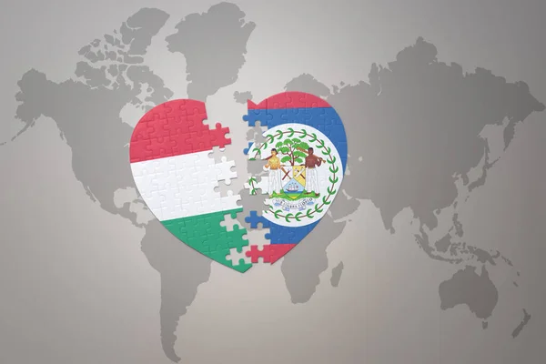 Puzzle Srdce Národní Vlajkou Belize Maďarské Pozadí Světové Mapy Concept — Stock fotografie