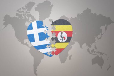 Uganda ve Yunanistan 'ın ulusal bayrağıyla ilgili bir bulmaca kalbi dünya haritasında. 3B illüstrasyon