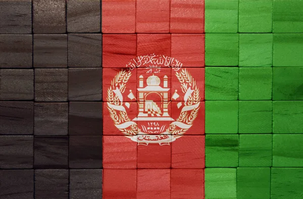 Πολύχρωμα Ζωγραφισμένα Μεγάλη Εθνική Σημαία Του Αφγανιστάν Μια Ξύλινη Κυβάκια — Φωτογραφία Αρχείου