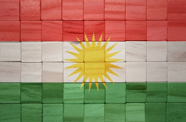 Kolorowe Malowane Duże Flagi Narodowe Kurdystanu Drewnianych Kostek Tekstury Ilustracja — Zdjęcie stockowe