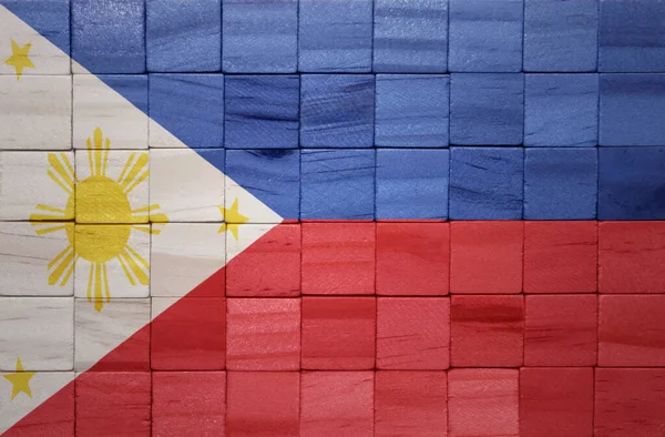 Ahşap Bir Küp Dokusuna Rengarenk Boyalı Büyük Ulusal Filipinler Bayrağı — Stok fotoğraf