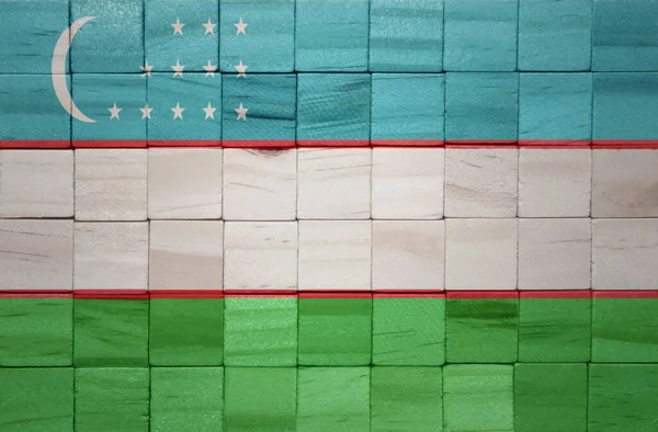 Kleurrijke Geschilderde Grote Nationale Vlag Van Oezbekistan Een Houten Blokjes — Stockfoto