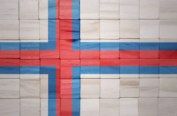 在木制立方体纹理上彩绘的法罗群岛大旗 3D说明 — 图库照片