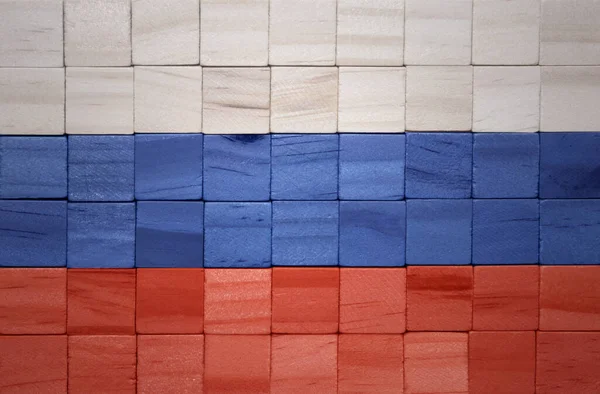 五彩斑斓的俄罗斯国旗在木制立方体纹理上 3D说明 — 图库照片