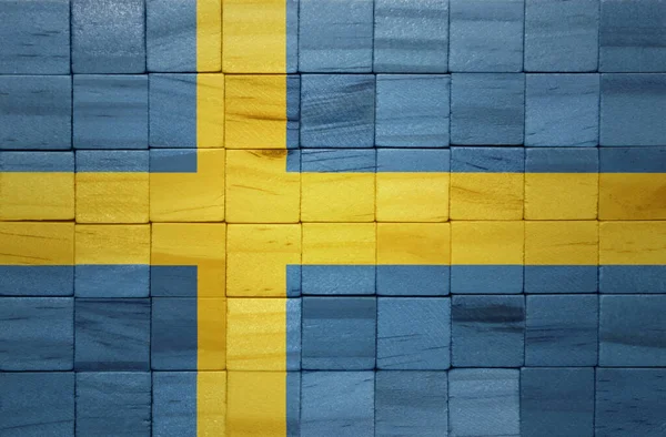 色彩艳丽的瑞典国旗挂在木制立方体纹理上 3D说明 — 图库照片