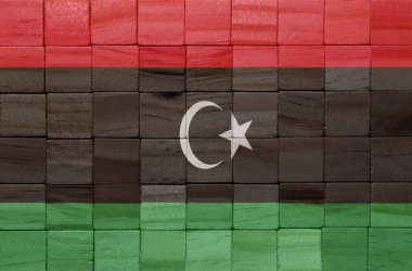 Tahta küp dokusunda büyük bir ulusal libya bayrağı. 3d illüstrasyon