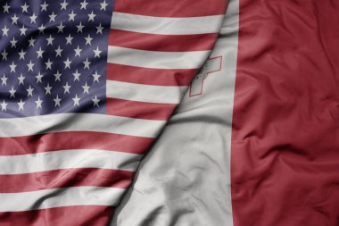 Amerika Birleşik Devletleri 'nin renkli bayrağı ve Malta' nın ulusal bayrağı sallanıyor. makro