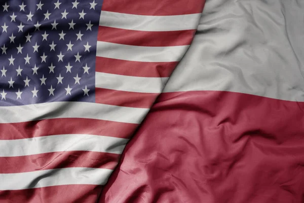 アメリカのカラフルな旗とポーランドの国旗を振っています マクロ — ストック写真