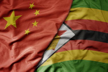 Çin 'in ulusal renkli bayrağı ve Zimbabwe' nin ulusal bayrağı sallanıyor. makro