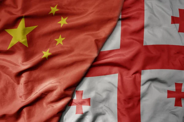 中国の大きな波の国旗とジョージアの国旗 マクロ マクロ — ストック写真