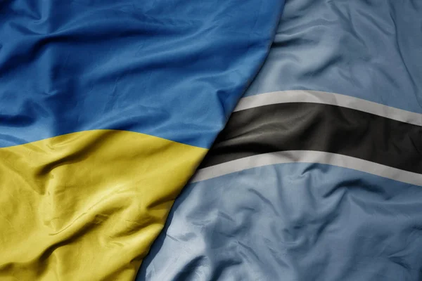 Ukrayna Nın Ulusal Bayrağı Botswana Nın Ulusal Bayrağı Sallanıyor Makro — Stok fotoğraf