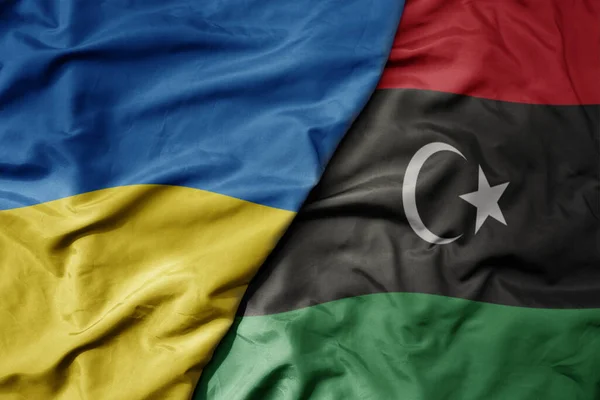 Gran Ondeando Bandera Nacional Colorida Ucrania Bandera Nacional Libya Macro — Foto de Stock