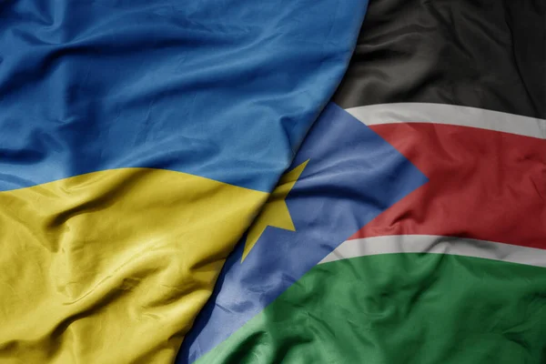 Ukrayna Nın Ulusal Bayrağı Güney Sudan Ulusal Bayrağı Sallanıyor Makro — Stok fotoğraf
