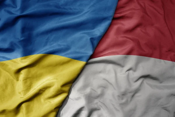 Ukrayna Nın Ulusal Bayrağı Endonezya Nın Ulusal Bayrağı Sallanıyor Makro — Stok fotoğraf