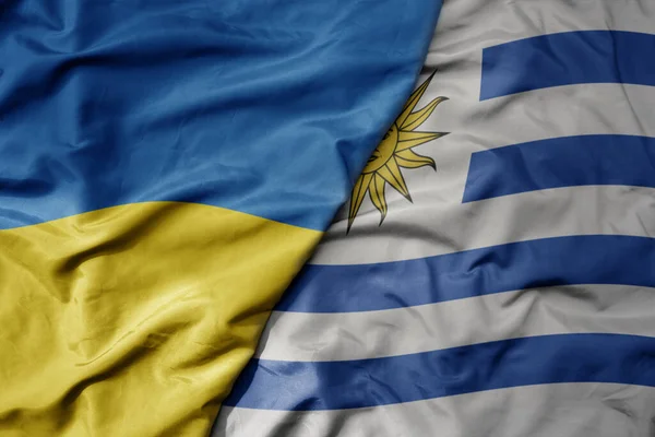 Ukrayna Nın Ulusal Bayrağı Uruguay Ulusal Bayrağı Sallanıyor Makro — Stok fotoğraf
