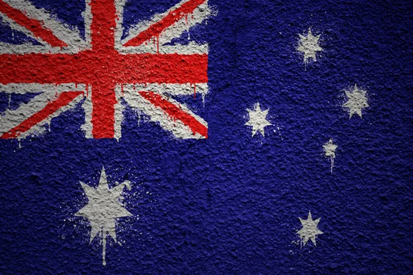 五彩斑斓的澳大利亚国旗挂在一面巨大的破墙上 — 图库照片