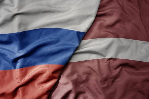 Big Waving Realistic National Colorful Flag Russia National Flag Latvia — Stock Photo, Image