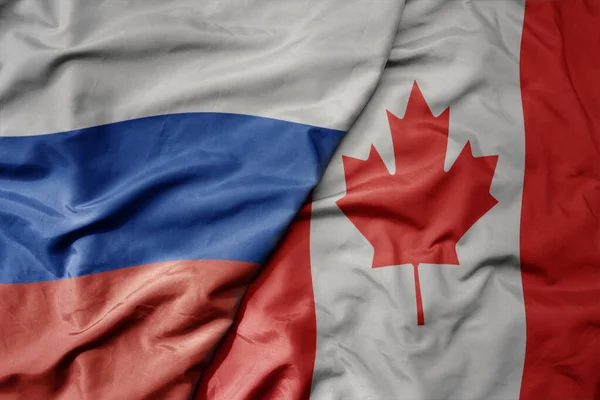 ロシアの現実的な国旗とカナダの国旗 マクロ マクロ — ストック写真