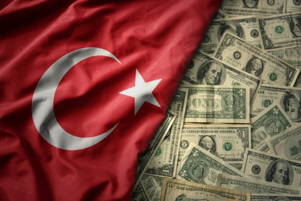 stock image big colorful waving national flag of turkey on a american dollar money background. finance concept