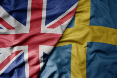 Büyük Britanya bayrağı ve İsveç ulusal bayrağı sallanıyordu. makro