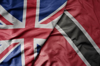 Büyük Britanya bayrağı, Trinidad ve Tobago 'nun ulusal bayrağı sallanıyor. makro