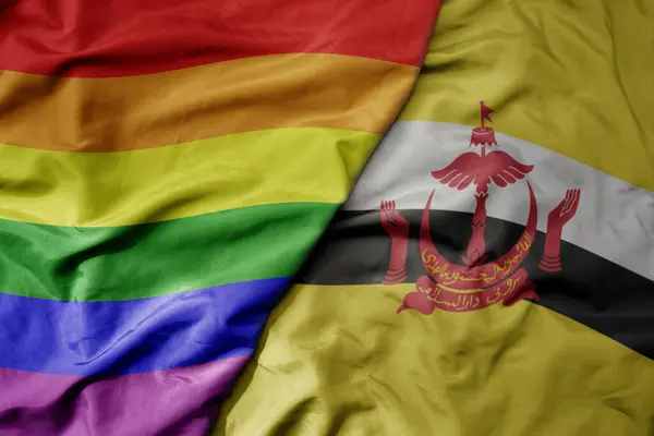 Stora Viftande Realistiska Nationella Färgglada Flagga Brunei Och Regnbåge Gay — Stockfoto