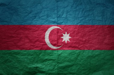 grunge eski kağıt doku arka planında Azerbaijan 'ın renkli büyük ulusal bayrağı