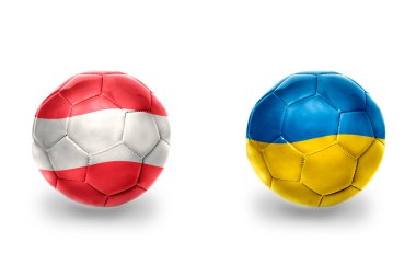 Ukrayna ve Avusturya ulusal bayraklı gerçekçi futbol topları, futbol takımları. beyaz arkaplanda.