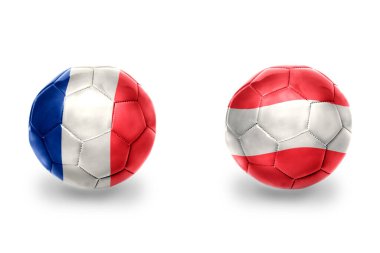 Fransa ve Avusturya ulusal bayraklı gerçekçi futbol topları, futbol takımları. beyaz arkaplanda.