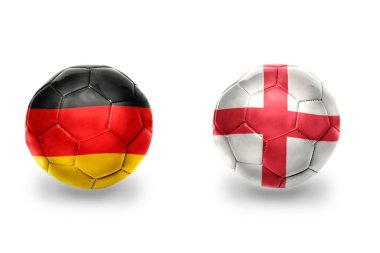 Almanya, İngiltere ve futbol takımlarının bayraklı gerçekçi futbol topları. beyaz arkaplanda.