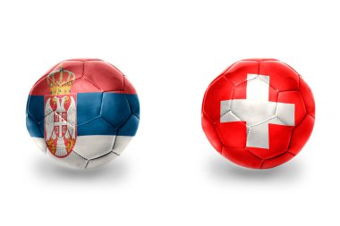 İsviçre ve Sırbistan 'ın ulusal bayraklı gerçekçi futbol topları, futbol takımları. beyaz arkaplanda.