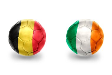İrlanda ve Belçika 'nın ulusal bayraklı gerçekçi futbol topları, futbol takımları. beyaz arkaplanda.