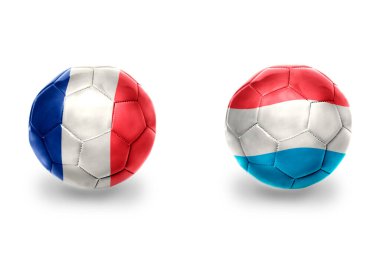 Fransa ve Lüks Bayraklı gerçekçi futbol topları, futbol takımları. beyaz arkaplanda.