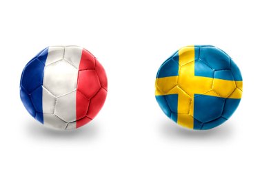 Fransa ve İsveç ulusal bayraklı gerçekçi futbol topları, futbol takımları. beyaz arkaplanda.