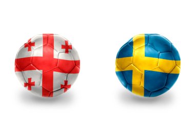 İsveç ve Gürcistan ulusal bayraklı gerçekçi futbol topları, futbol takımları. beyaz arkaplanda.