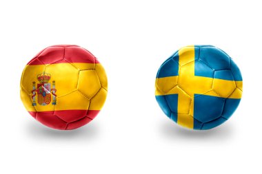 İspanya ve İsveç ulusal bayraklı gerçekçi futbol topları, futbol takımları. beyaz arkaplanda.