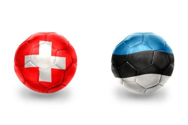 Ulusal Estonya ve İsviçre bayraklı gerçekçi futbol topları, futbol takımları. beyaz arkaplanda.
