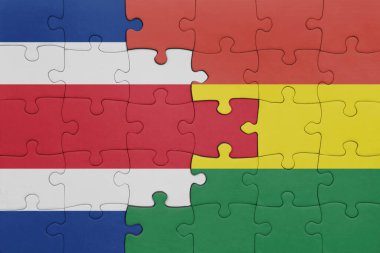 Bolivya 'nın renkli ulusal bayrağı ve Kosta Rika bayrağıyla ilgili bulmacalar. konsept