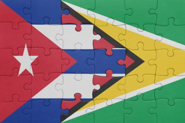 Guyana 'nın renkli ulusal bayrağı ve Küba bayrağı ile bulmaca. konsept