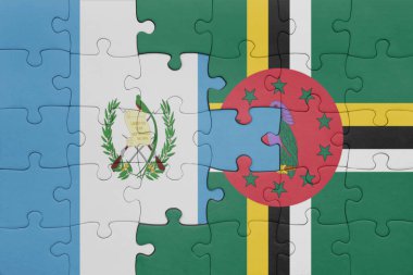 Dominika 'nın renkli ulusal bayrağı ve Guatemala bayrağıyla ilgili bulmacalar. konsept