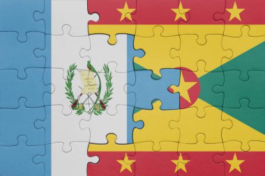 Grenada bayrağı ve Guatemala bayrağının rengarenk yapbozu. konsept