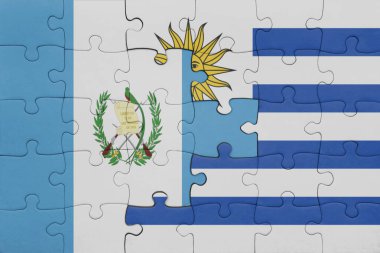Uruguay 'ın renkli ulusal bayrağı ve Guatemala bayrağıyla ilgili bulmacalar. konsept
