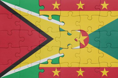 Grenada 'nın renkli ulusal bayrağı ve Guyana bayrağı ile bulmaca. konsept
