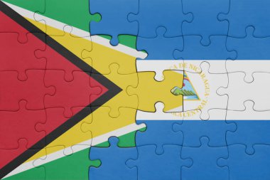 Nikaragua 'nın renkli ulusal bayrağı ve Guyana bayrağı. konsept